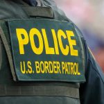 Police US Border Patrol uniform close up