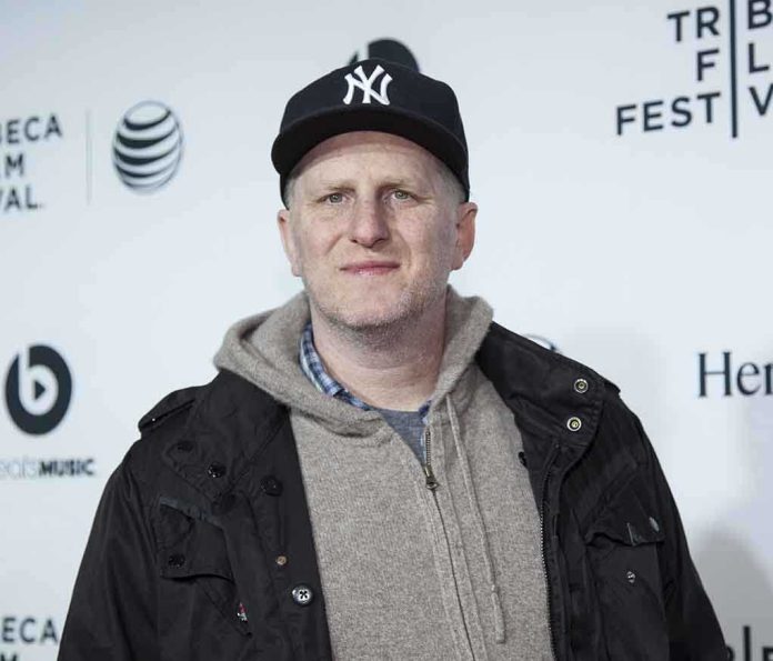 Man wearing a New York Yankees cap and casual clothing at a film festival