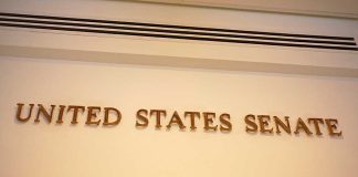 Sign displaying United States Senate in a government building