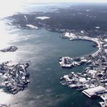 Rescuers search frigid Atlantic for missing fishermen after boat