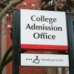 College admission office sign with accessibility indicator