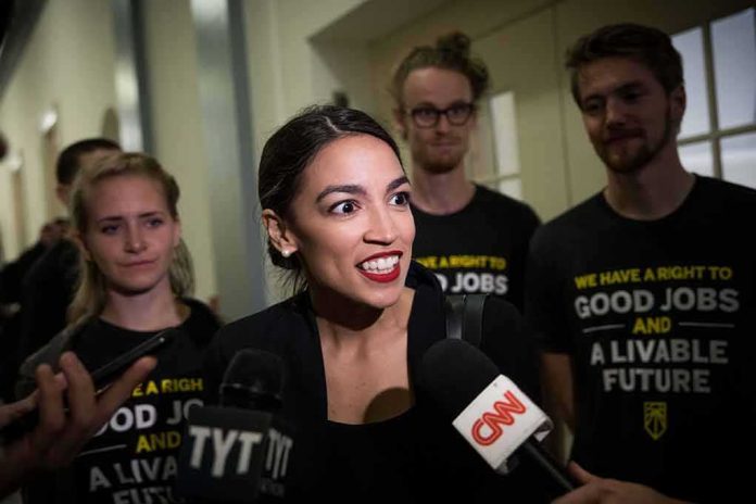 Woman speaking to reporters with microphones surrounded by supporters