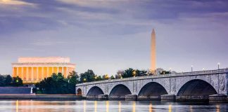 Arlington Memorial Bridge with monuments at dusk