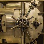 Vault door with steel locking wheel and handle