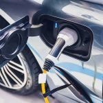 Electric car charging port with plugged-in connector