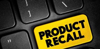 Keyboard key labeled product recall in bright yellow