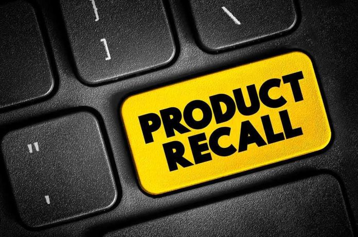 shutterstock_2327937115 Keyboard key labeled product recall in bright yellow